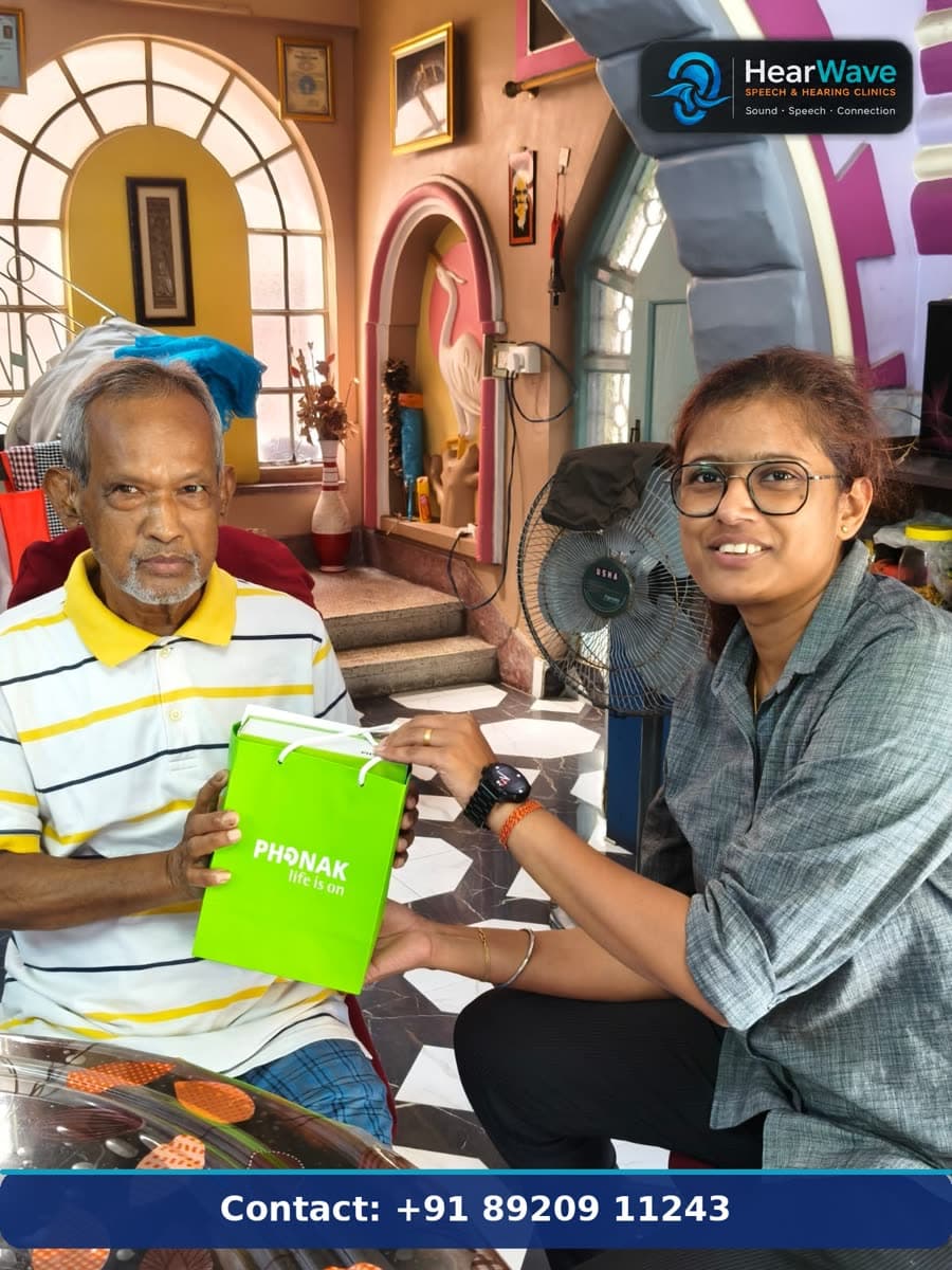 Hearwave audiologist with a patient during a home visit in Kolkata